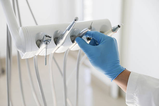 Professional Tooth Extraction technician working in Luce County County, MI